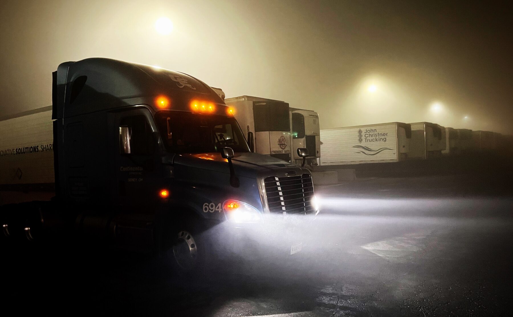 An image of Ned's truck on a foggy evening
