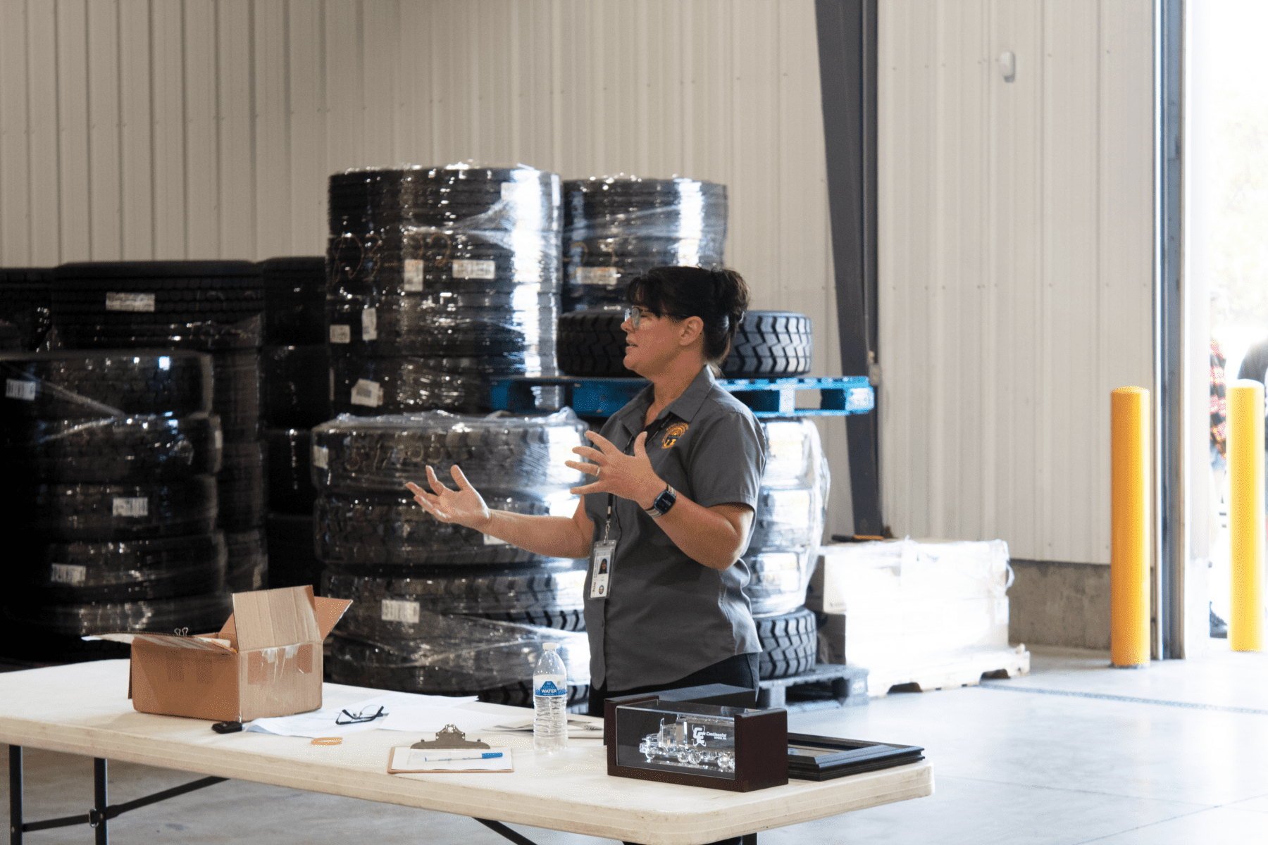 Julie Clement of the Public Utilites Commission of Ohio addresses drivers at Continental Express Driver Appreciation Picnic